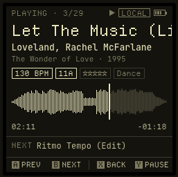 The key playing a track: Let The Music by Loveland and Rachel McFarlane, 130 BPM, key 11A, five stars, Dance. A waveform, 02:11 elapsed and 01:18 left, next track Ritmo Tempo. The buttons read prev, next, back, pause.